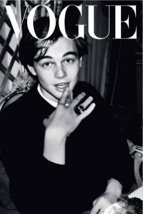 ALT 054’s Vogue - Leo is a black-and-white poster featuring a young man with tousled hair in a dark lifestyle collection top, gazing at the camera indoors—perfect as a striking large regular fashion poster.