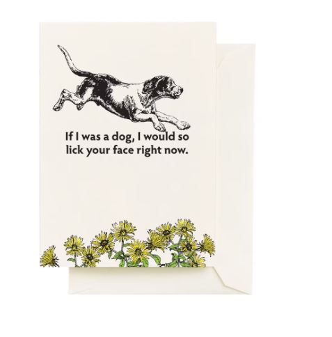 The Blue Dog Posters “Lick Your Face Greeting Card” is a blank, eco-friendly card showing a dog leaping over “If I was a dog, I would so lick your face right now,” with yellow flowers and a recycled paper envelope.