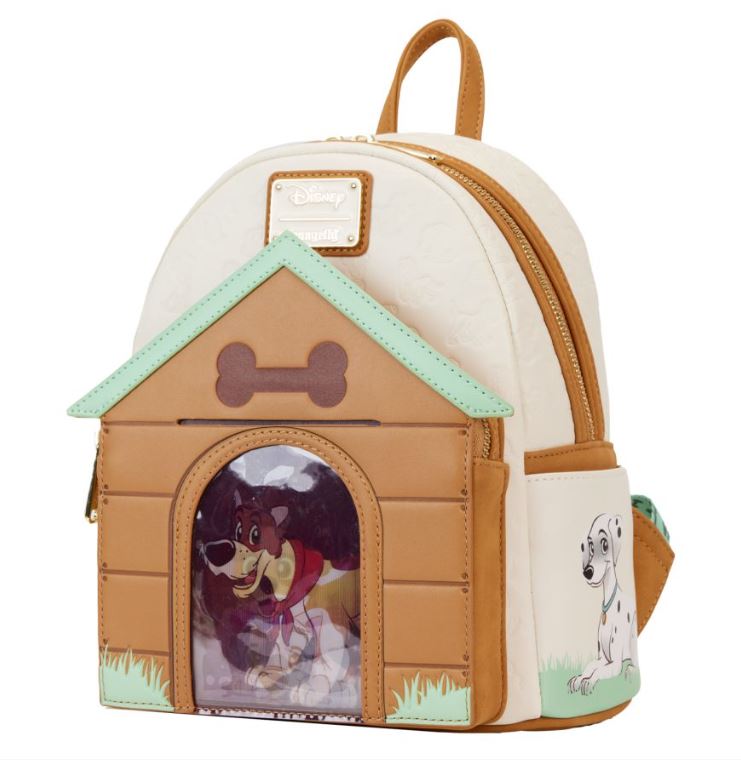 Introducing the Disney I Heart Dogs Mini Backpack by Blue Dog Posters, a charming mini backpack styled like a brown doghouse with a bone on top. The entrance of the doghouse features a clear window showcasing a joyful, triple lenticular Disney dog. The main body of the backpack is white with an additional illustration of a dog on the side pocket. Tan straps and a top handle complete this delightful design.
