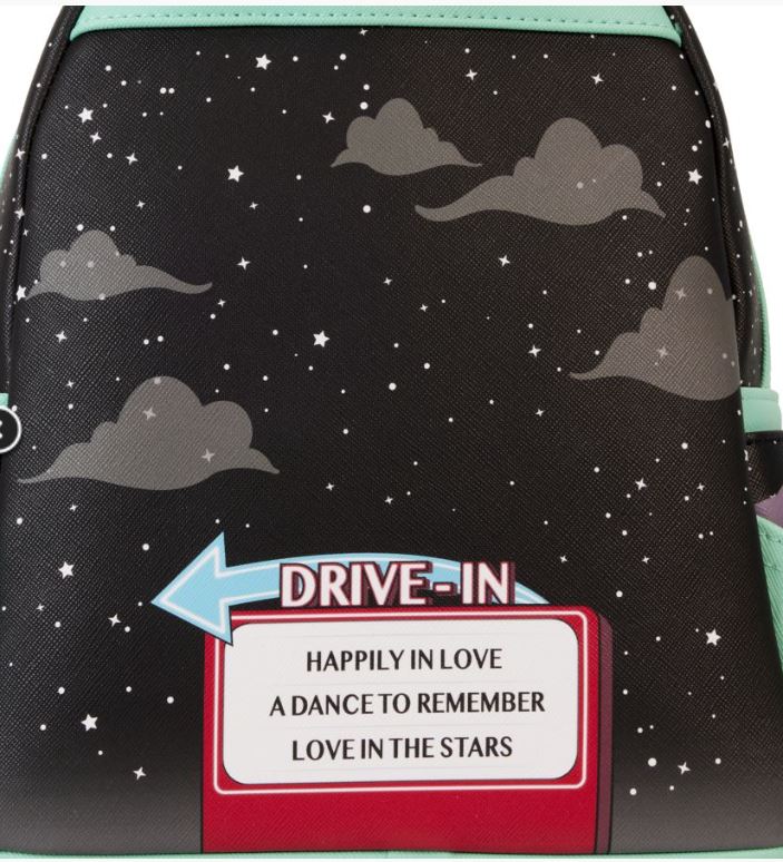 Introducing the Disney Mickey & Minnie Date Drive In Backpack by Blue Dog Posters. This Disney Loungefly backpack features a black background adorned with starry night and cloud designs. It showcases a red and white "Drive-In" sign with an arrow pointing left. Below, the text reads, "Happily in Love, A Dance to Remember, Love in the Stars." The trim is a light green color.
