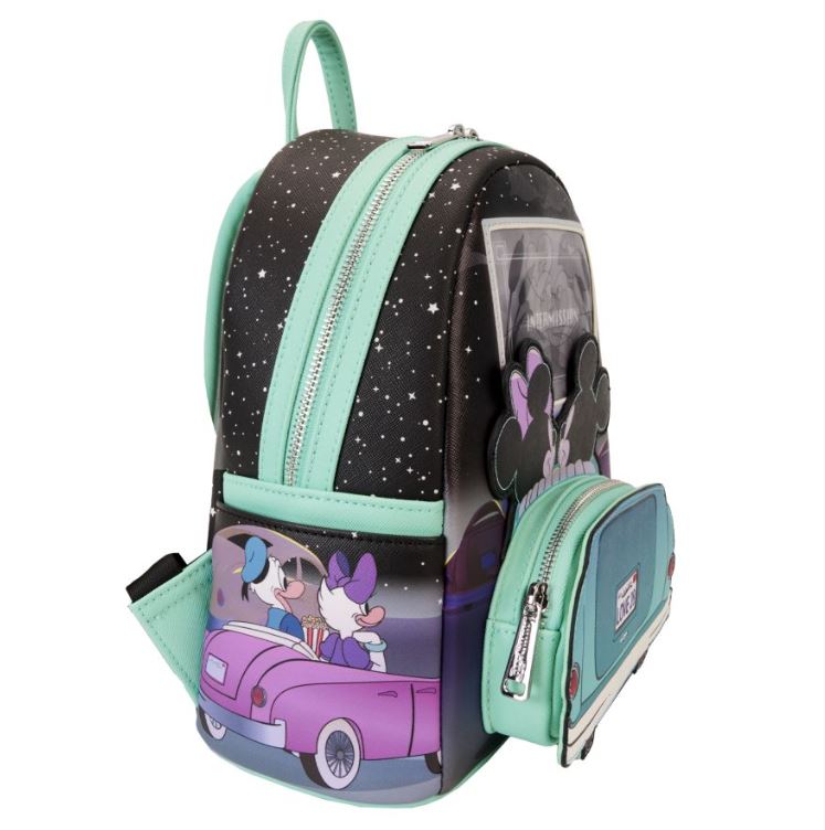 The Disney Mickey & Minnie Date Drive In Backpack by Blue Dog Posters features a charming design with Mickey Mouse and Minnie Mouse driving a purple car. The black sections of the backpack are adorned with white stars, while teal zippers and straps add a pop of color. The playful scene of the characters enjoying their drive adds to the backpack's whimsical appeal.