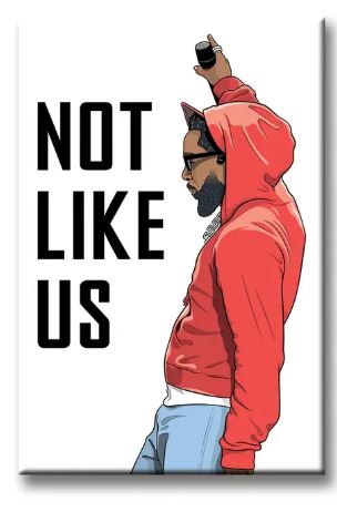 The Kendrick Not Like Us Magnet by Blue Dog Posters features a bearded man in a red hoodie and glasses holding a mic beside "NOT LIKE US" text on white—an eye-catching fridge magnet, proudly made in the USA.