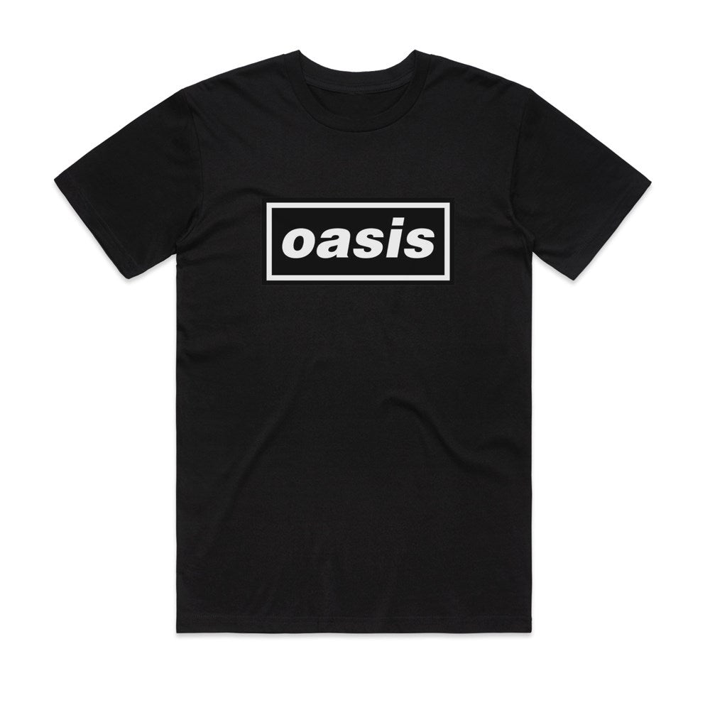 The Official Oasis T-Shirt Black SML by Blue Dog Posters features a classic black design with a bold white "oasis" logo on the front, inspired by vintage band shirts and the iconic Decca style.