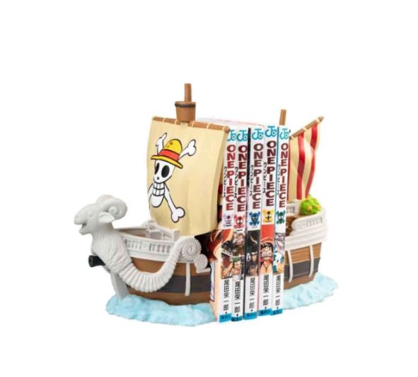Display your "One Piece" manga with the Blue Dog Posters One Piece -Going Merry Bookends Pair, crafted in hand-painted resin and shaped like the iconic ship with a straw hat skull sail—perfect for fans and collectors.
