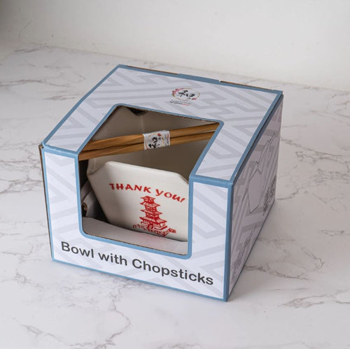 The Blue Dog Posters Takeout Box Serving Bowl With Chopsticks THANK YOU features a microwave-safe ceramic bowl with a red pagoda and “THANK YOU” text, plus wooden chopsticks displayed through a window in the packaging.
