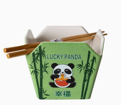 The Blue Dog Posters Takeout Box Serving Bowl With Chopsticks PANDA is a green, microwave-safe ceramic bowl with bamboo designs, a cartoon panda eating noodles, "LUCKY PANDA" text, and two wooden chopsticks—perfect for reusable takeout.