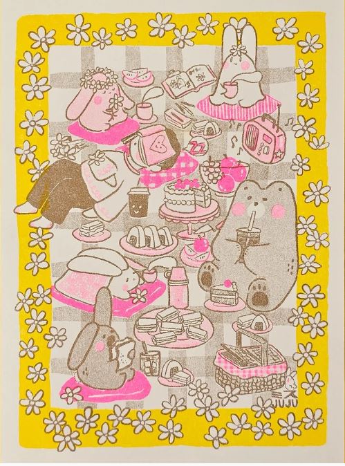 Picnic Riso Print by Misu Juju from Blue Dog Posters features cute cartoon rabbits and a bear at a picnic with cakes, white flowers, a yellow border, pink accents, and charming risograph print details.