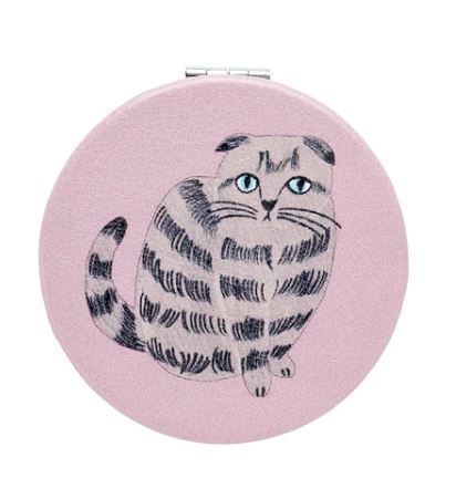 The Round Compact Mirror Pink Cat by Blue Dog Posters features a cute gray and black striped cat with blue eyes on a pink case—perfect for cat lovers who want an adorable magnifying mirror for their bag or pocket.