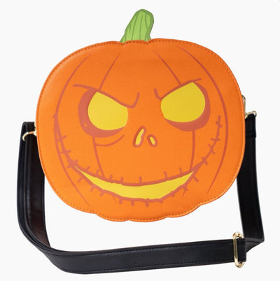 The NBX Skellington Jack O Lantern Crossbody by Blue Dog Posters is a round Halloween crossbody bag designed to resemble a Jack-o'-lantern with an orange exterior, yellow eyes, a carved sinister smile, and a green stem at the top. It features a black adjustable strap and gold hardware against a plain white background. Perfect for fans of The Nightmare Before Christmas.