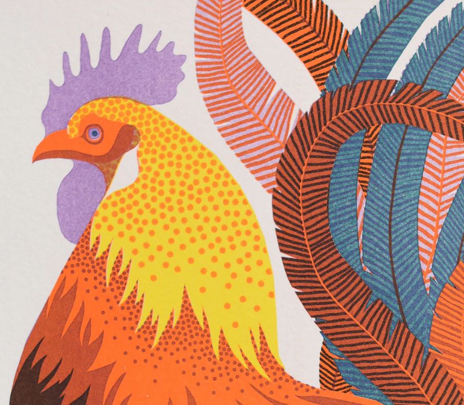 The Rooster A4 Risograph by Vicki Johnson for Blue Dog Posters features a vibrant, stylized rooster with yellow and orange body, purple comb and wattle, and blue-orange patterned tail feathers on a light background.