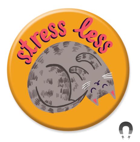 The Stress Less Cat Magnet by Blue Dog Posters is a round orange magnet made from recycled materials, showing a smiling gray cat sleeping with "stress less" in playful red letters for a touch of feline positivity.
