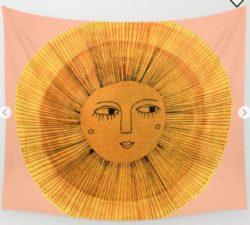 The "Sun Drawing Sewzinski Art Textile Sml" by Blue Dog Posters is a lightweight wall tapestry that displays a stylized sun with a human face, featuring closed eyes, a small smile, and rosy cheeks. It is surrounded by vivid yellow and orange rays set against a soft pink background.