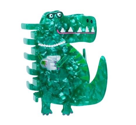 The T-Rex Hair Claw by Blue Dog Posters is a green, cartoon-style accessory with textured marbled coloring, featuring glasses, a pearl necklace, and holding a teacup—perfect for adding quirky ceramic-inspired charm to any collection.
