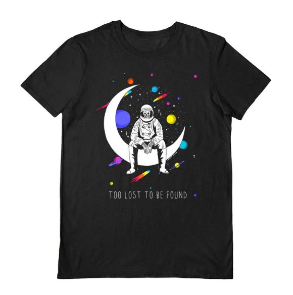 The Darker Days Too Lost Black T-Shirt XL by Blue Dog Posters features an astronaut on a crescent moon with planets and stars, plus the text "TOO LOST TO BE FOUND." Perfect for dreamers who love cosmic style.