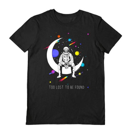 The Darker Days Too Lost Black T-Shirt XL by Blue Dog Posters features an astronaut on a crescent moon with planets and stars, plus the text "TOO LOST TO BE FOUND." Perfect for dreamers who love cosmic style.
