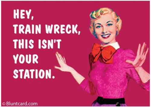 The Train Wreck Magnet by Blue Dog Posters features a retro woman in a pink dress and red bow with the phrase, "Hey, train wreck, this isn't your station." A hilarious fridge magnet and perfect conversation starter.