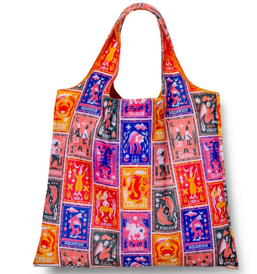 The Zodiac Art Sack by Blue Dog Posters is a recycled rPET bag with vibrant zodiac signs in red, orange, pink, blue, and black. Each square shows an astrological sign with its name—perfect for astrology lovers.