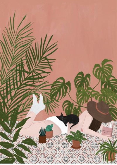 From the Featured Artists Collection, this art print, Friends by Chloe Joyce from fap, depicts a serene scene: a woman lounging on a patterned rug surrounded by lush green plants. Dressed in light-colored clothing and wearing a sunhat, she enjoys her book as a small black cat lies beside her. The soft pink background enhances the relaxing atmosphere.