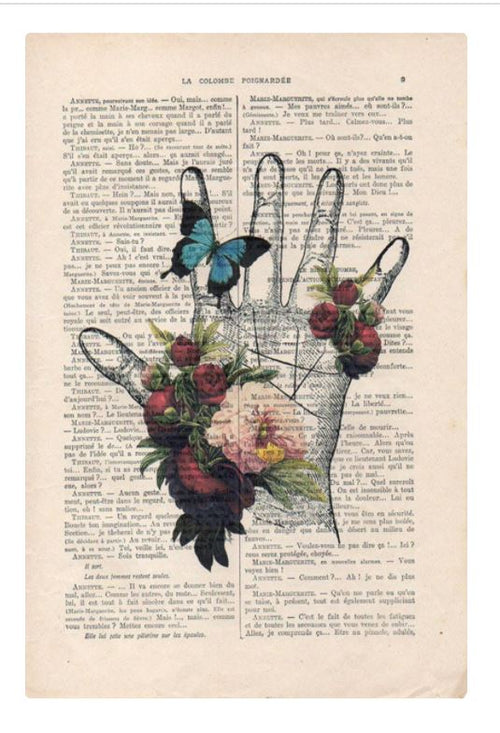 A vintage book page features a sketched hand outlined in black ink, with colorful flowers and a bright blue butterfly resting on the index finger and thumb. The text of antique French books is visible in the background, providing a whimsical, mixed-media aesthetic. This charming artwork is captured beautifully in the ABP Antique Book print 29 x 19cm Hand Peony.