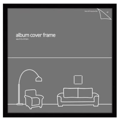 A black Album Frame 31.5 x 31.5cm Black from Blue Dog Posters is depicted with an illustration of a cozy living room. The room includes an armchair, a floor lamp, a sofa, and a small framed picture on the wall. Text on the frame indicates the size: 31.5 x 31.5 cm—perfect for keeping your vinyl protected.