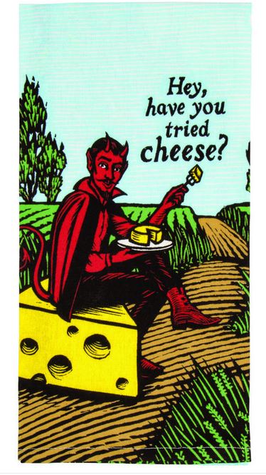 An illustration shows a devilish character in a red outfit and tail sitting on a large block of cheese in a rural field. The character, holding a fork with cheese and a plate, is featured on our fade-resistant, high-quality cotton Hey, Have You Tried Cheese Dish Towel. The text reads, "Hey, have you tried cheese? This unique item is proudly brought to you by Blue Dog Posters.
