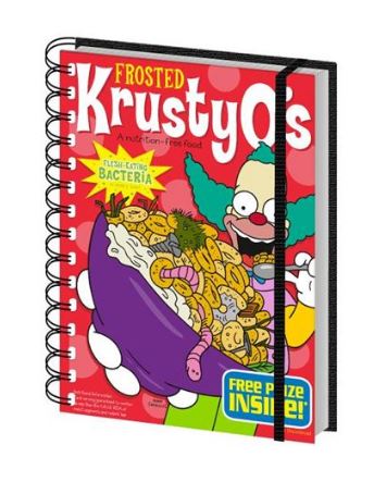 A colorful spiral-bound notebook styled to resemble a cereal box for "The Simpsons Krusty Os Notebook." The cover features an image of a clown holding a bowl of cereal with worms inside. Bold text advertises a "Free Prize Inside!" Part of our Premium Notebooks, this quirky item includes an elastic band closure by Blue Dog Posters.