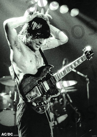 Black and white photo of an electric guitarist performing on stage. The shirtless musician stands with arms up, hands gripping the guitar's neck and headstock. Stage lights illuminate the scene from above, and a drum set is visible in the background—perfect for any rock poster in your music collection.

Replacement:
AC/DC ANGUS YOUNG - 1979 by MUS 326