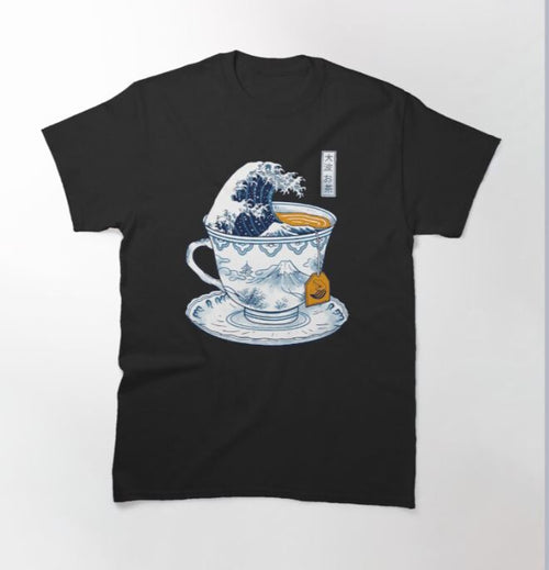 The Great Kanagawa Tea T-shirt Black LARGE by Blue Dog Posters features a teacup with a blue wave inspired by "The Great Wave off Kanagawa," a mountain saucer motif, and a tea bag with an orange tag for an artistic touch.